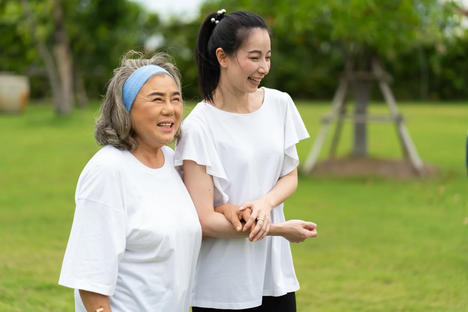 Elderly woman with carer