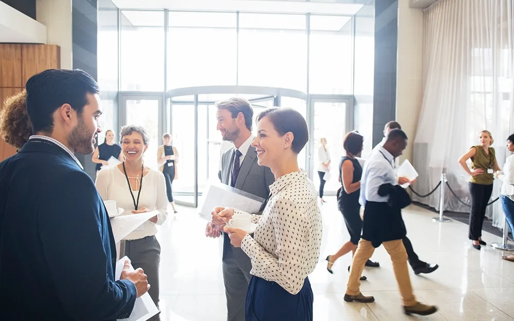 Group of office workers in building lobby