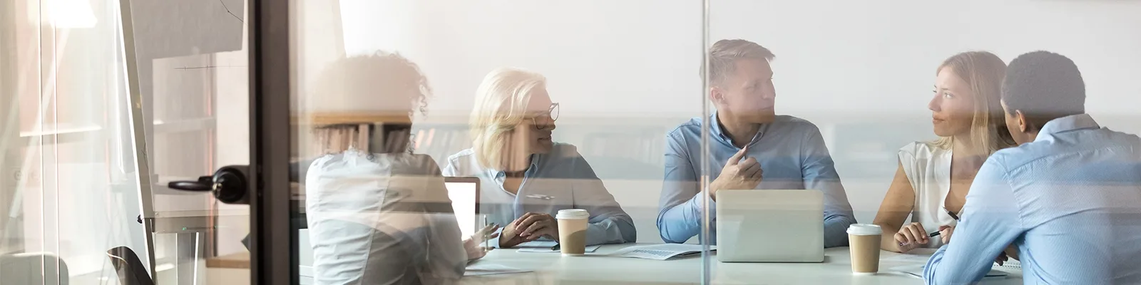 Team of colleagues discussing in conference room