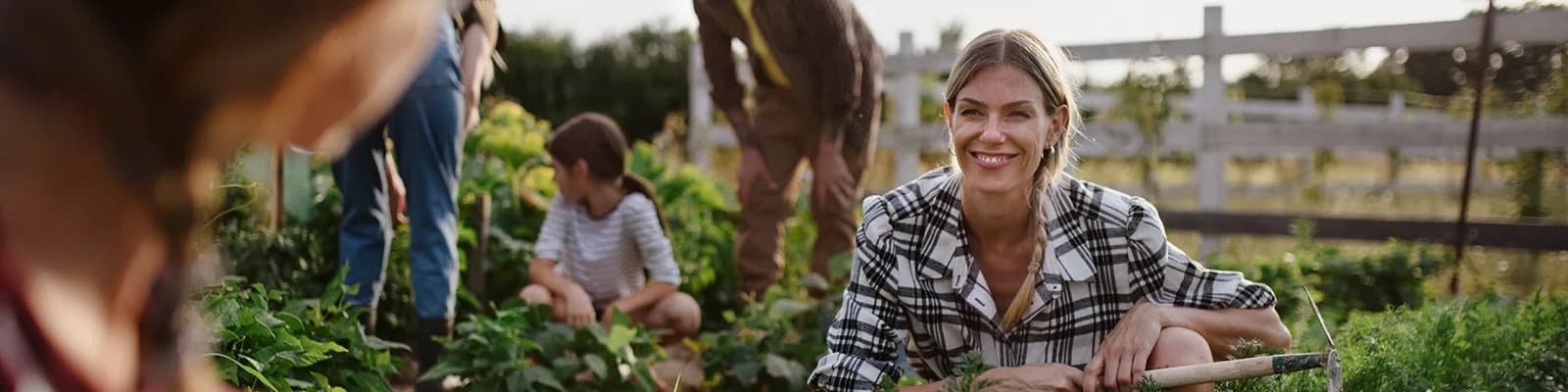 Group of people gardening together