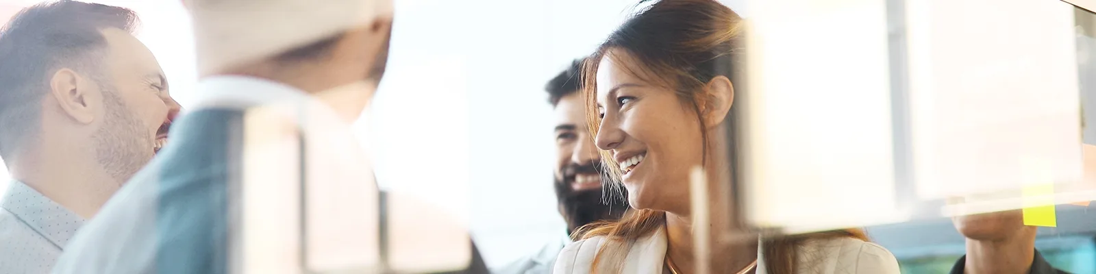 Co-workers collaborating in meeting room